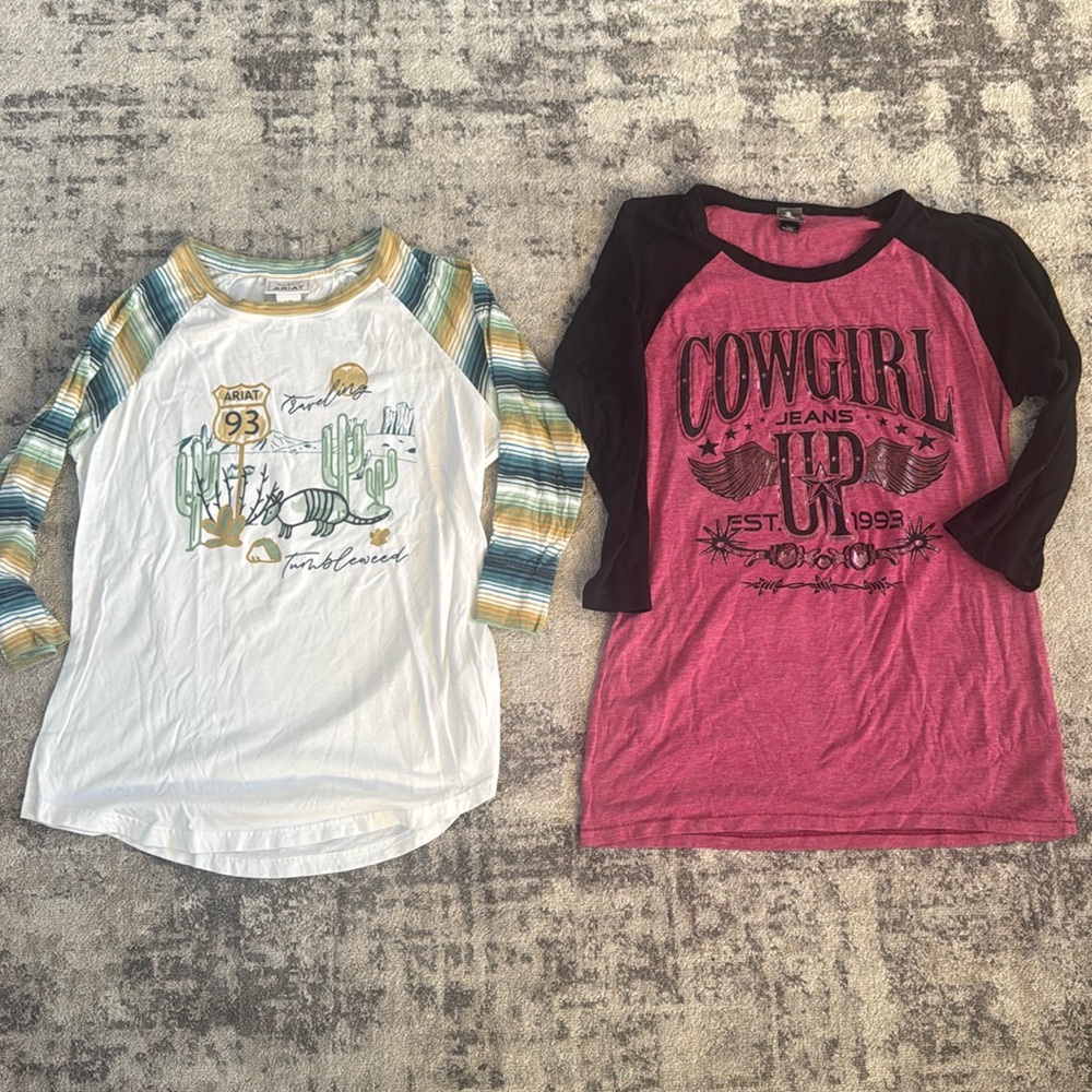 Two trendy western long sleeve shirts, Ariat and Cowgirl Up